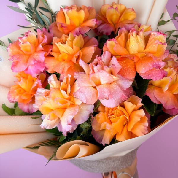 12 reflexed orange roses 2