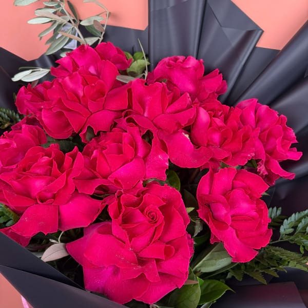 12 Hot pink reflexed roses 1