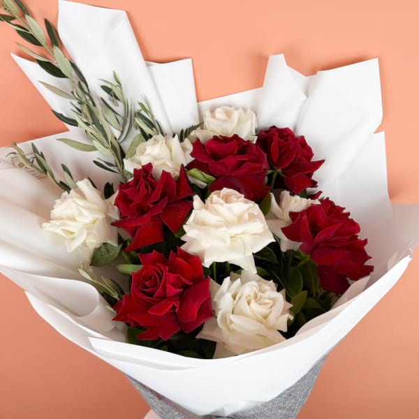 12 reflexed red and white roses 1