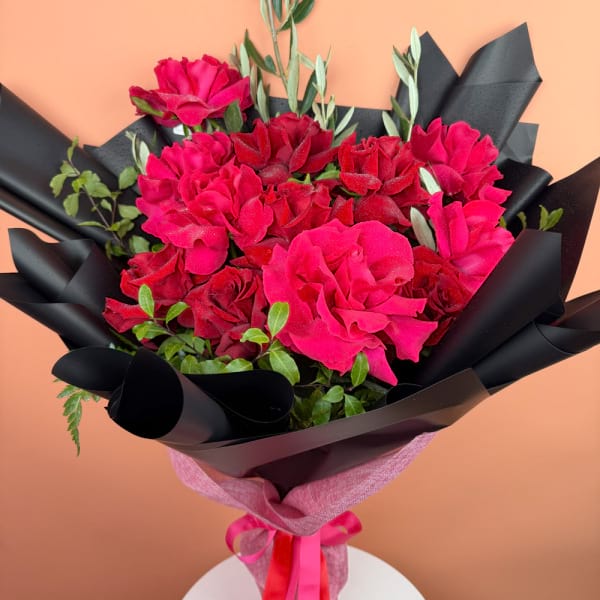 12 Reflexed Hot pink and red roses 1