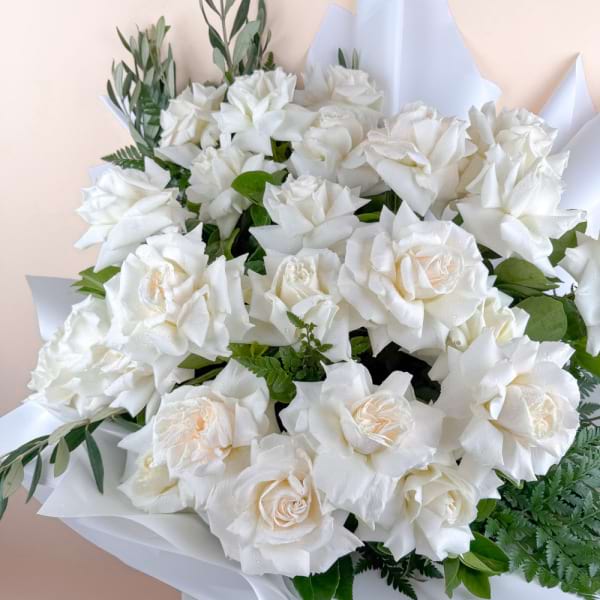 24 white reflexed roses 1