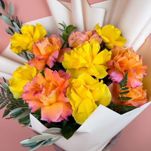 12 reflexed orange and yellow roses 1
