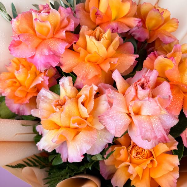 12 reflexed orange roses 3