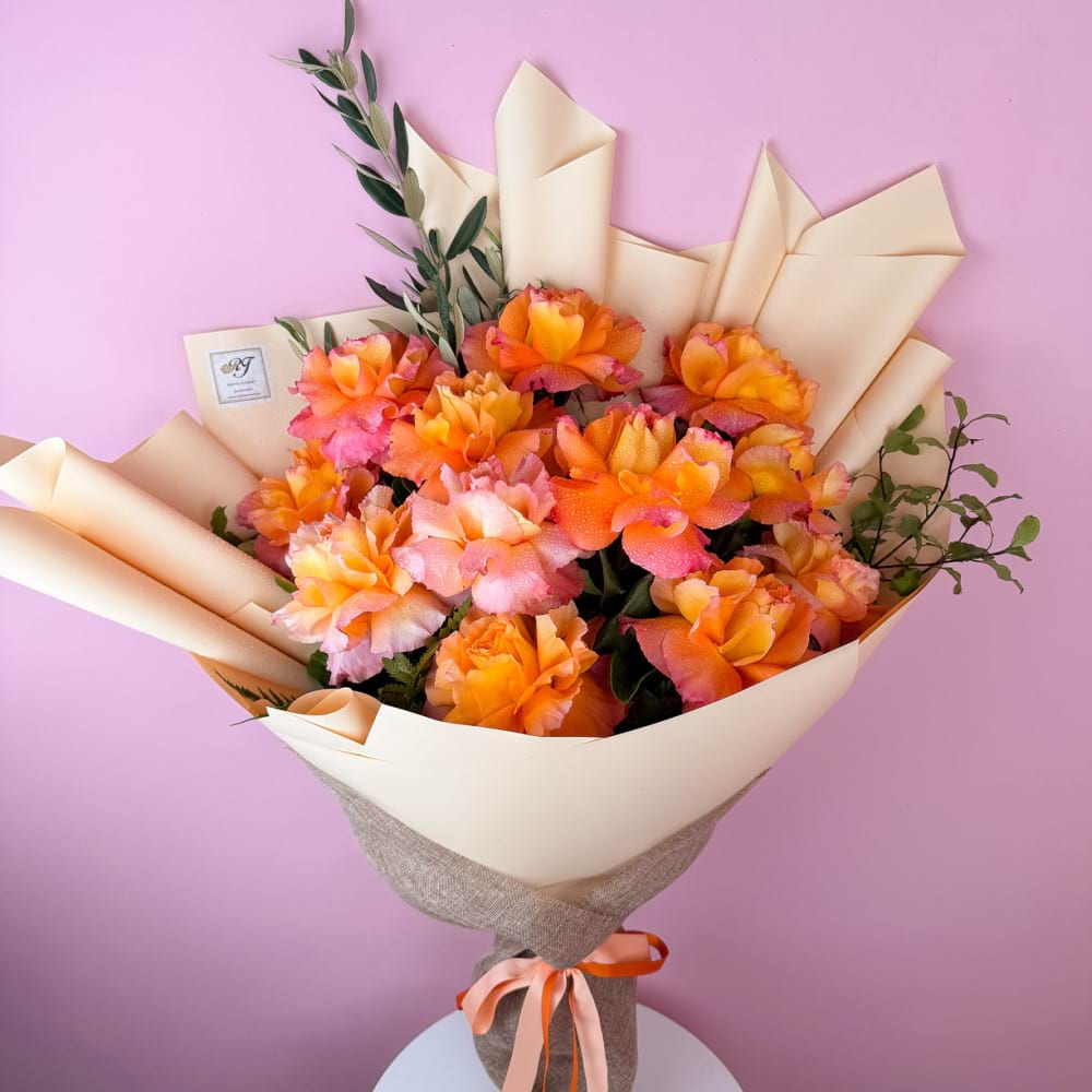 12 Reflexed Orange Roses Bouquet