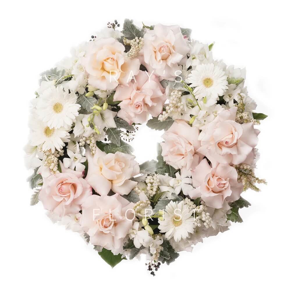 Pink & White Funeral Wreath with Seasonal Flowers