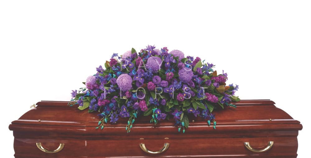 Contemporary Seasonal Purple and Blue Casket Spray